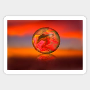 Glass globe on sunset background Sticker